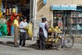 Ecuadorian ethnic woman selling coconuts in the street