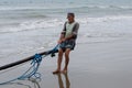 Ecuadorian fishermen pulling in their nets