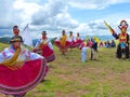 Ecuadorian folk dancers dressed as Cayambe people performance outdoors traditional dance for tourists