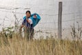 Ecuadorian woman with a load on her back Royalty Free Stock Photo