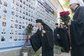 Ecumenical Patriarch Bartholomew carries flowers to Memory Wall of Fallen Defenders of Ukraine in russian-ukrainian war