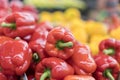 ed pepper on street market shelf. Red bell pepper pattern. Background of fresh sweet heap of red pepper paprica closeup vegetable Royalty Free Stock Photo