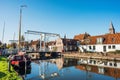 Edam old town, Netherlands. Picturesque canal with boat in Waterland district near Amsterdam.