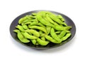 Edamame nibbles, boiled green soy beans, japanese