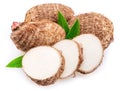 Eddoe or taro tubers and its slices isolated on white background