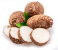 Eddoe or taro tubers and its slices isolated on white background