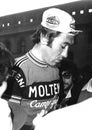 Eddy Merckx at the starting sign of a cycling race.