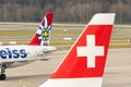 Edelweiss Air Airbus A320-214 jet and a Swiss logo in Zurich in Switzerland