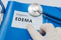 Edema - lymphatic diagnosis on blue folder with stethoscope Royalty Free Stock Photo