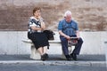 Ederly couple sitting on a bench Royalty Free Stock Photo