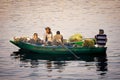 Edfu, Egypt - Jan 2019: Egyptian fisherman in boats on the Nile River going home with the day`s catch