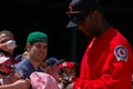 Edgar Renteria signs autographs for fans.