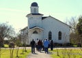 Edgard, Louisiana, U.S.A - February 2, 2020 - Visitors in front of the white church near Whitney Plantation