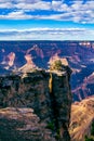 Edge of a canyon cliff at sunset Royalty Free Stock Photo