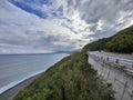 The edge of an island bordering mountain and sea