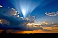 edge lit clouds focus on clouds lit from behind by the sun creat Royalty Free Stock Photo