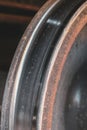 The edge of an old rusty wheel from a freight train car. Royalty Free Stock Photo