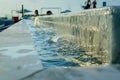 Edge of overflow swimming pool. Water cascade