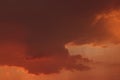 Edge of rain cloud in warm sunset light. Royalty Free Stock Photo