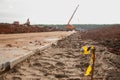 The edge of the road. Part of the road is made of concrete slabs. Construction of a temporary road Royalty Free Stock Photo