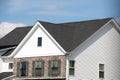 edge of roof shingles on top of the house dark asphalt tiles on the roof background color