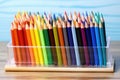 edge view of desk organizer filled with sketching pencils of different gradients Royalty Free Stock Photo
