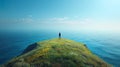 At the edge of the world, where the sky meets the sea in a breathtaking horizon, a lone figure s Royalty Free Stock Photo