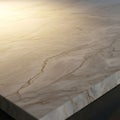 The edges are slightly chamfered revealing the thickness of the marble Royalty Free Stock Photo
