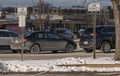 Edgewood, Pennsylvania, USA January 21, 2024 Two car services signs in a parking lot in the Edgewood Towne Centre