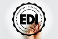 EDI Electronic Data Interchange displayed in a circular stamp outline with a hand drawing the shape, highlighting digital transfer Royalty Free Stock Photo