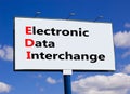 EDI electronic data interchange symbol. Concept words EDI electronic data interchange billboard on a beautiful blu sky background Royalty Free Stock Photo