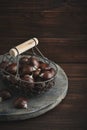 Edible chestnuts in a metal basket