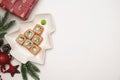 Edible christmas tree made from Philadelphia roll on white background. Royalty Free Stock Photo