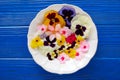 Edible flowers salad in a plate Royalty Free Stock Photo