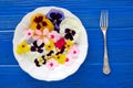 Edible flowers salad in a plate Royalty Free Stock Photo