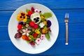 Edible flowers salad in a plate Royalty Free Stock Photo