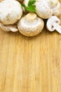 Edible fresh culture mushrooms and cutting board