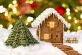 Edible gingerbread house and cookie christmas tree Royalty Free Stock Photo