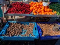 Edible snails and fruit, Estoi Gypsy Market, Algarve, Portugal.