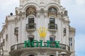 Edificio Grassy building with the Rolex sign one of the most beautiful buildings on Gran Via street in Madrid, Spain Royalty Free Stock Photo