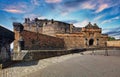 Edinburgh castle - front view with gatehouse at sunset, Castlehill, Scotland - nobody Royalty Free Stock Photo