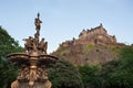 Edinburgh Castle seen from West Princes Street Gardens with the Ross Fountain in the foreground Royalty Free Stock Photo