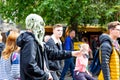 Alien hands out flyers at The Edinburgh Fringe 2018 on The Royal Mile Royalty Free Stock Photo