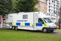 Police Command Unit Van Truck parked in a park in city location