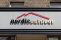 Nordic Outdoor clothing brand store entrance. Sign and branding