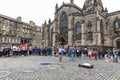 EDINBURGH, SCOTLAND 2022, August 22: Street artist performs in front of St Giles Cathedral