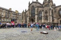 EDINBURGH, SCOTLAND 2022, August 22: Street artist performs in front of St Giles Cathedral