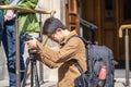 Edinburgh, Scotland, August 8th 2019. Photographer or Blogger shooting photos or video, using modern simple set of equipment