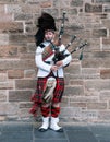 Edinburgh, Scotland; August 29th 2019: A Scottish bagpiper playing his musical instrument at the street Royalty Free Stock Photo