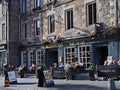 Edinburgh, Scotland - Grassmarket Square, with outdoor seating areas of restaurants